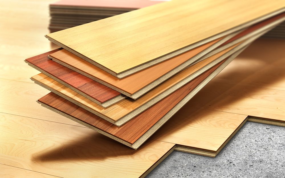 A Stack of Different Types of Wooden Flooring — Sly Bros in Woodburn, NSW
