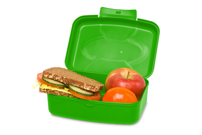 A green lunch box filled with a sandwich , apples , and tomatoes.