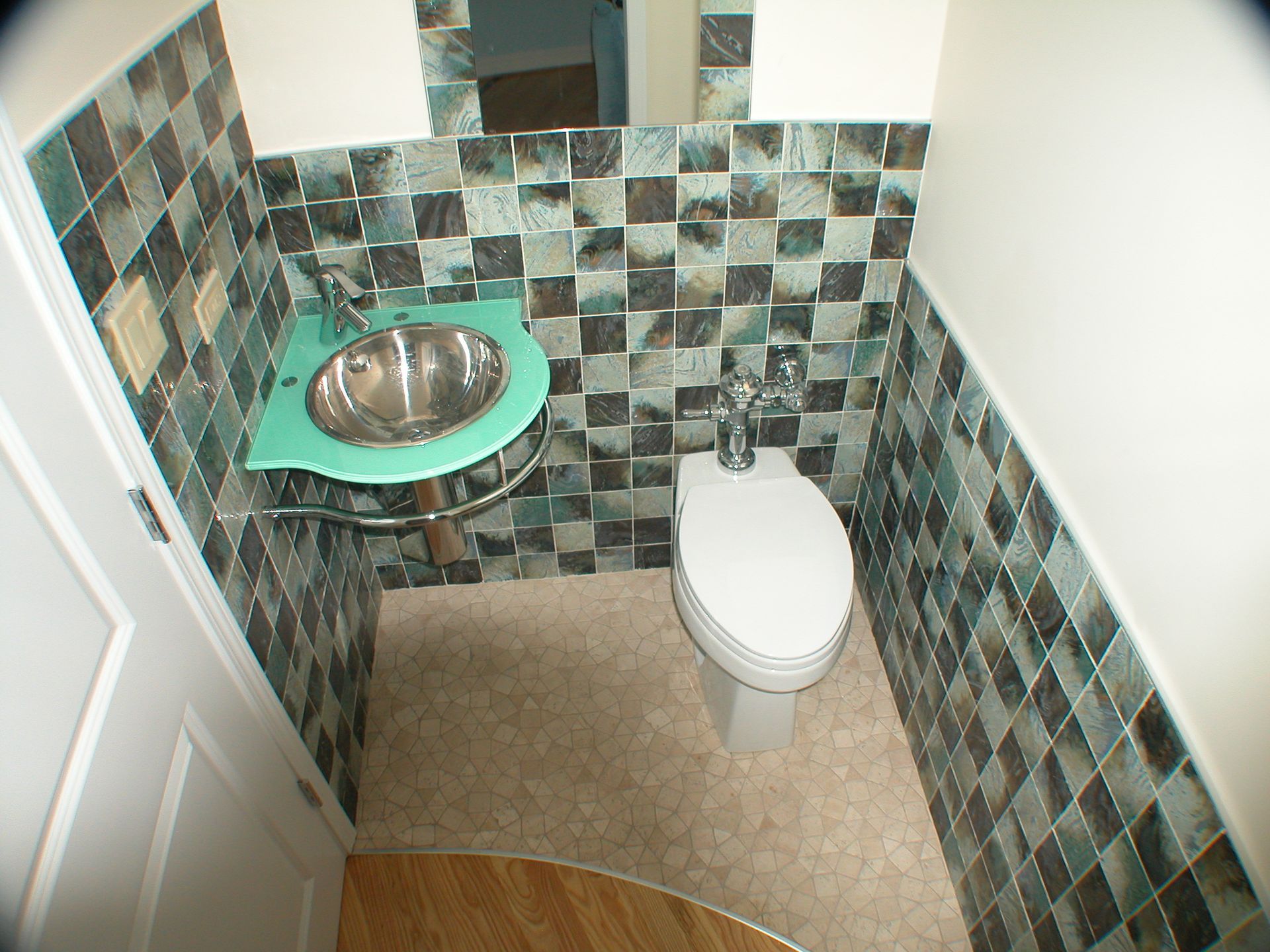 A small bathroom with a toilet and a sink