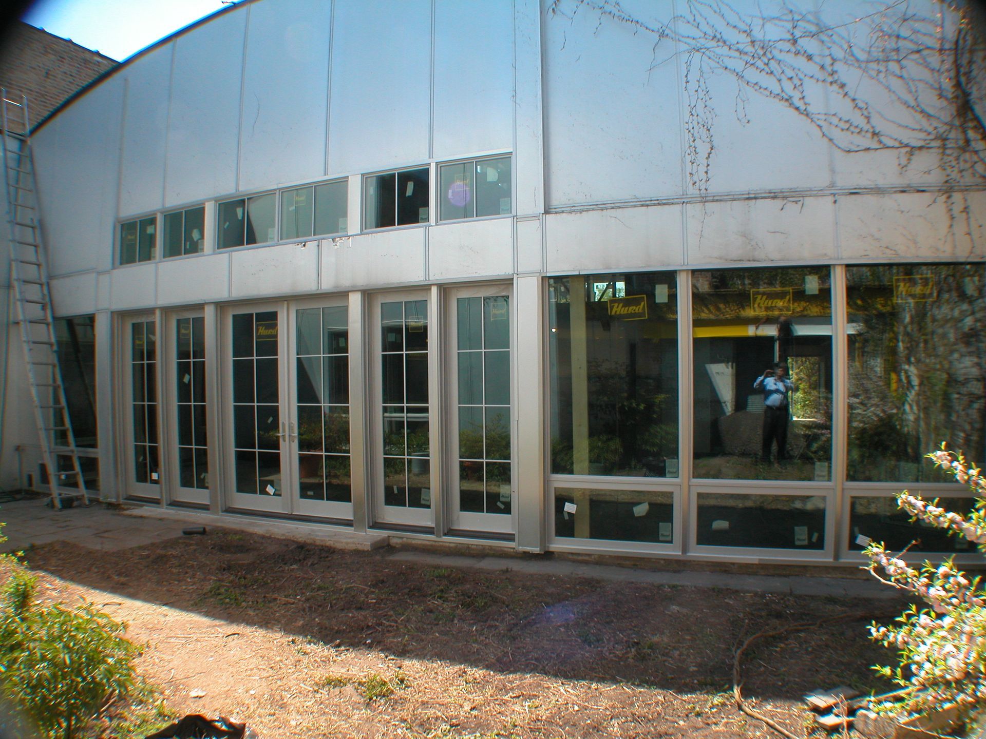 A large building with a lot of windows and doors