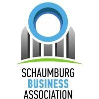 The logo for the schaumburg business association is a building with a blue circle in the middle.