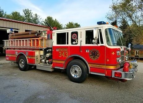 A red fire truck with the number 343 on the side