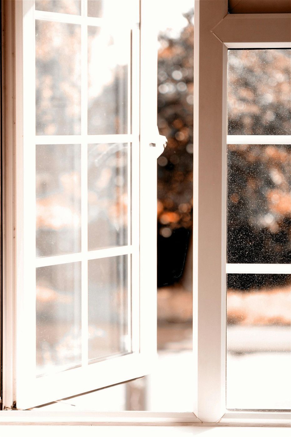 A uPVC window frame freshly painted white in a Swansea home.