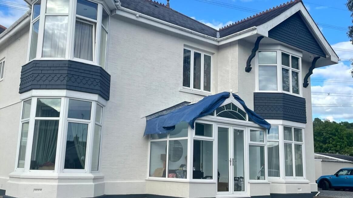 Exterior of Swansea (Mumbles) mansion with expertly painted walls by Daffodil Decor.