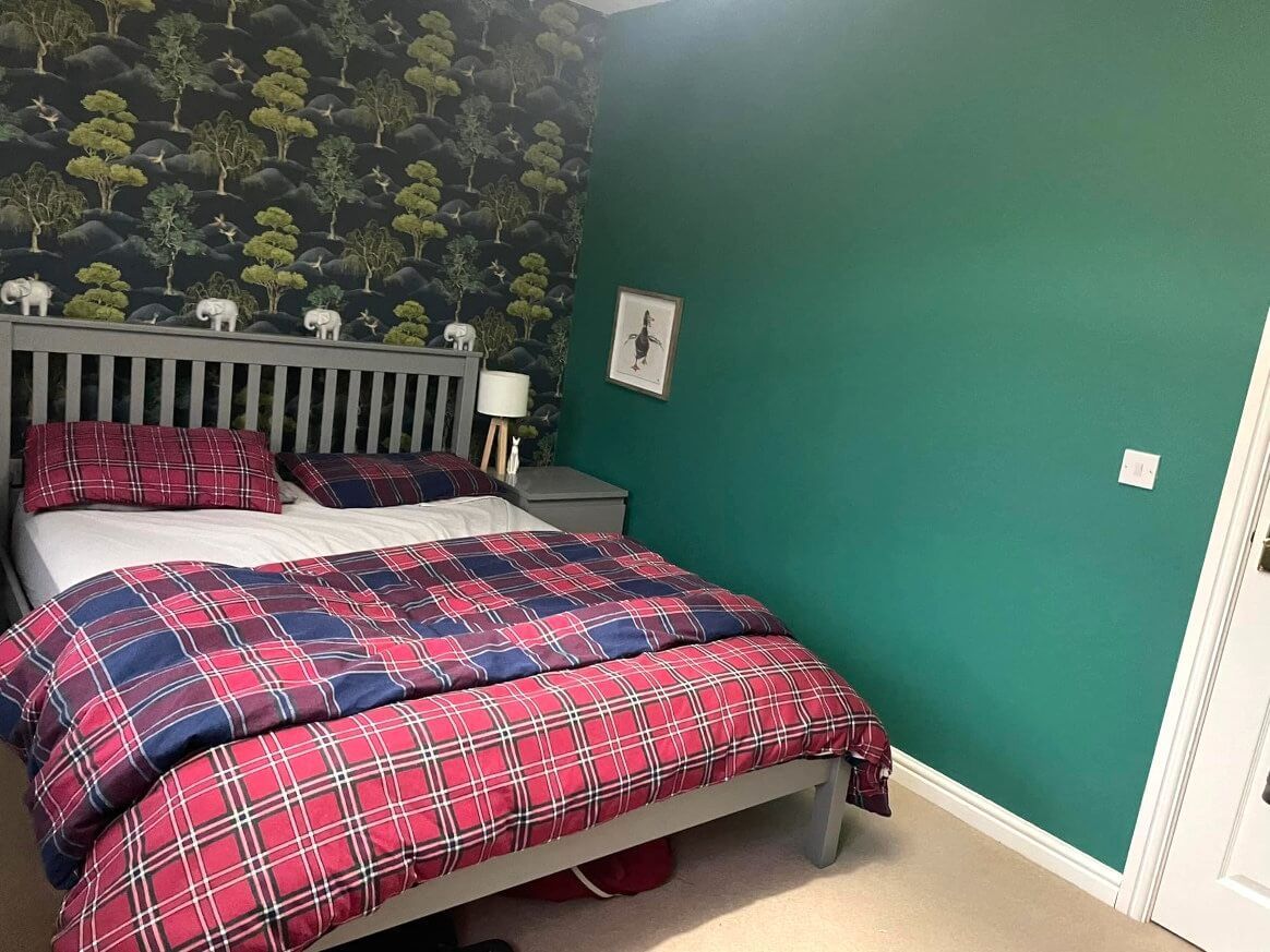 Painted and wallpapered Swansea bedroom in green style by Daffodil Decor.