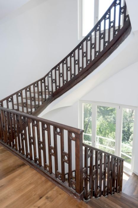 Wooden staircase expertly varnished by Daffodil Decor in Swansea, Wales.