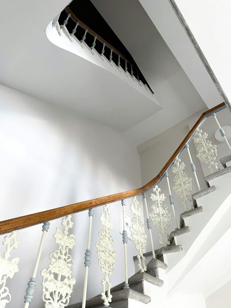 Wooden staircase expertly varnished by Daffodil Decor in Swansea, Wales.