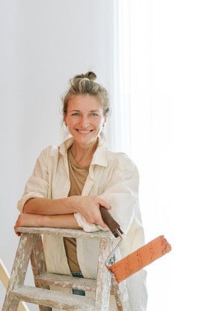 Smiling, friendly female painter and decorator in Swansea.