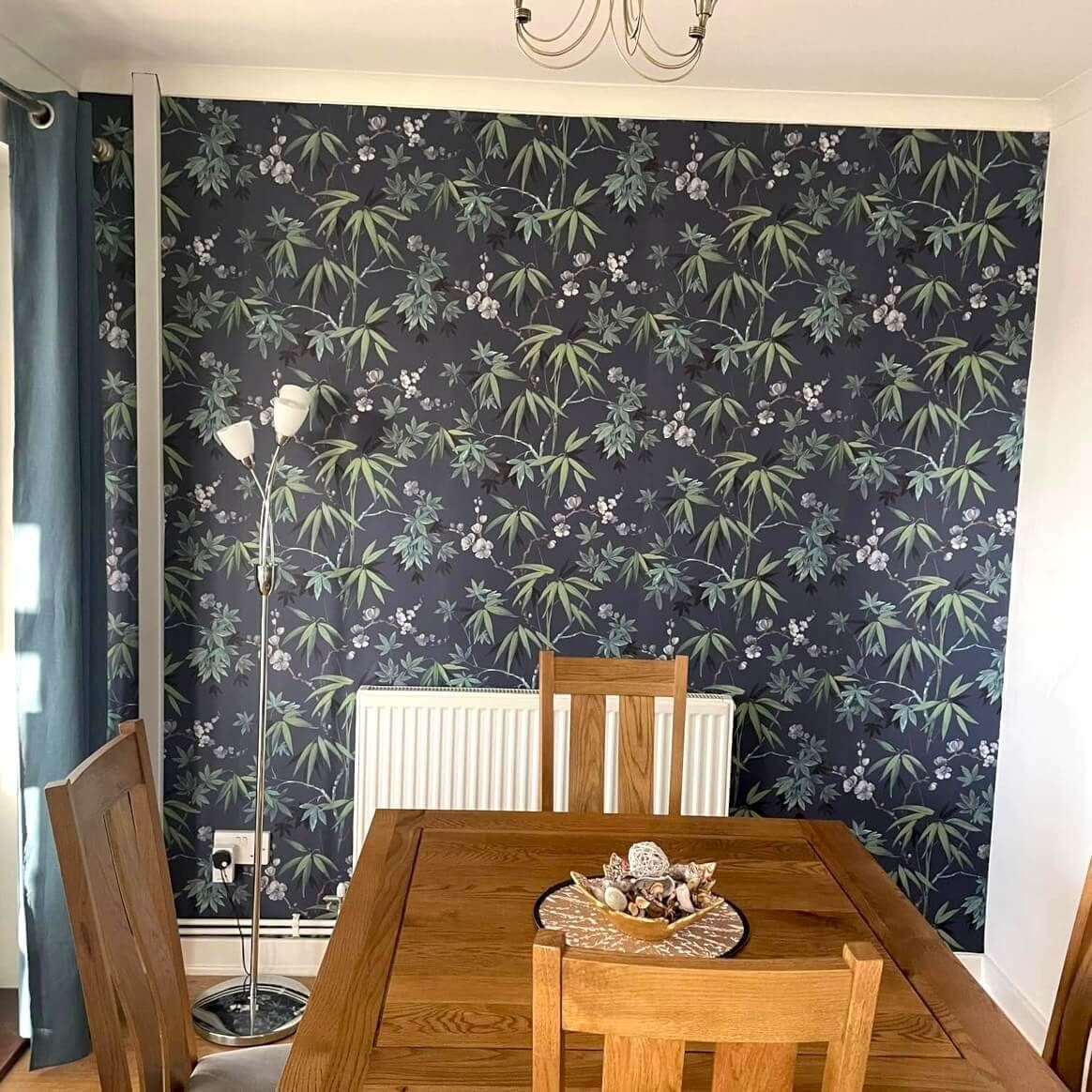 Swansea living room with dark floral wallpaper feature wall by Daffodil Decor.