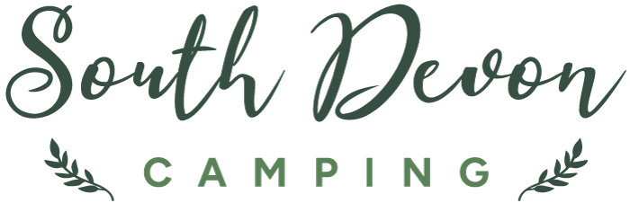 Logo for South Devon Camping. Green script text over 