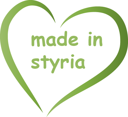 Ein grünes Herz mit der Aufschrift „Made in Styria“ darauf
