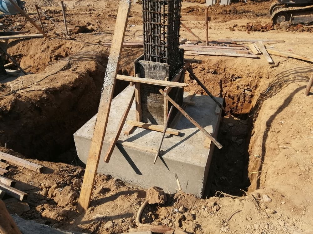 A Construction Site With a Concrete Block in the Middle — Tweed Coast Concrete Pumping in Tugun, QLD