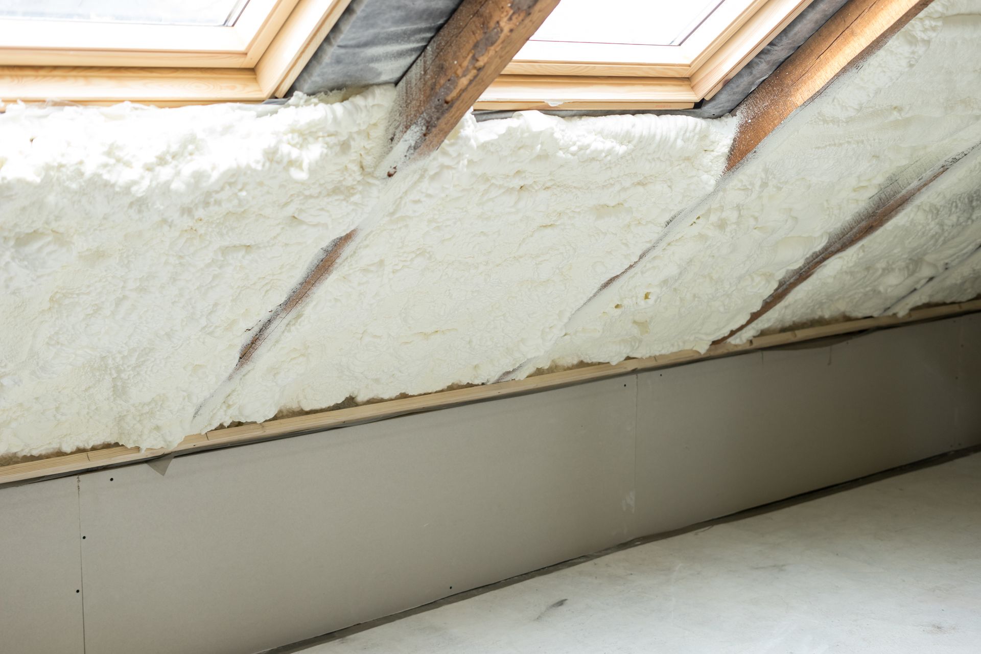 spray foam insulation on walls during home renovation