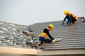 professional residential roofers during installation service