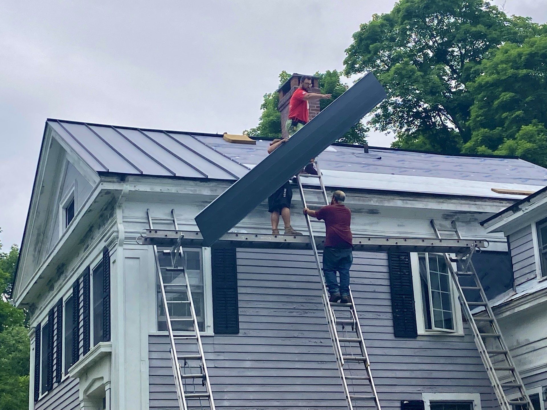 Three Men Working on the Roof — New Hartford, CT — A & J Quality Roofing LLC