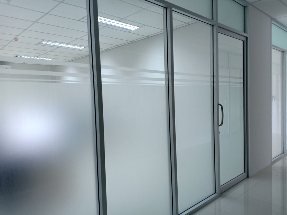 Empty Office Hallway With Frosted Glass Conference Room — ALUBEST Windows & Doors In Southport, QLD