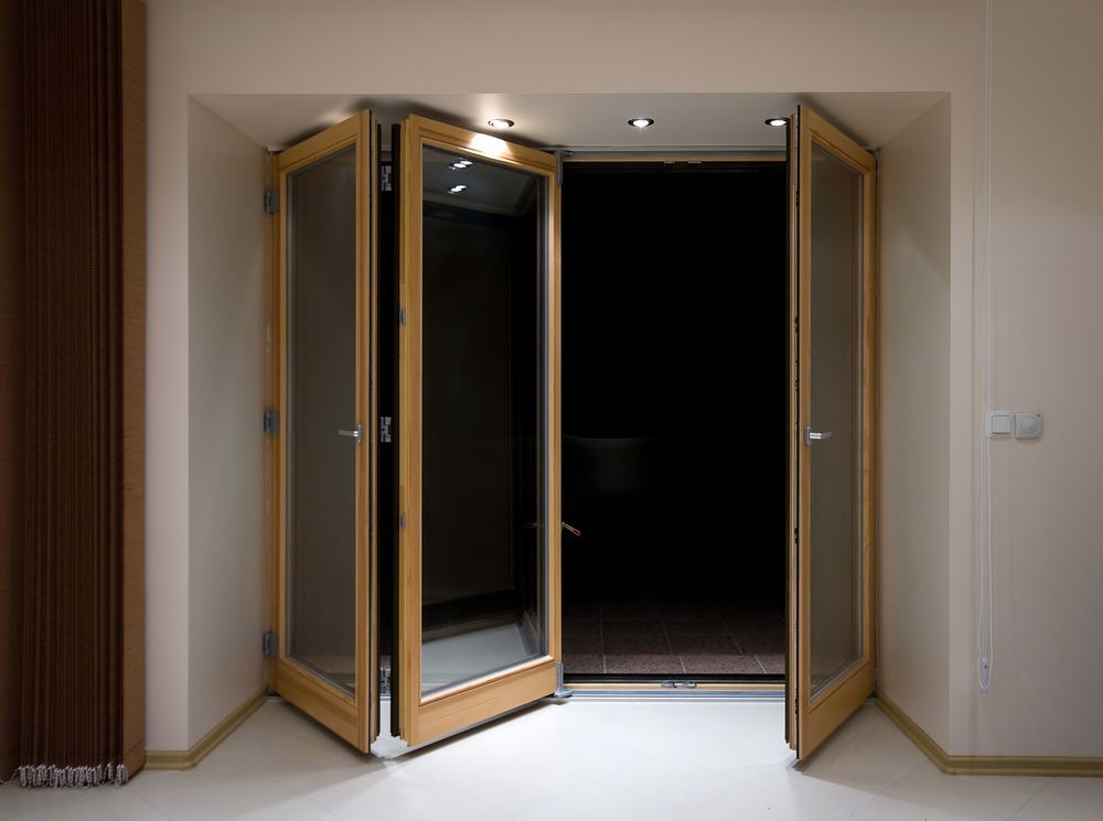 Open Wooden-framed Glass Double Doors Leading — ALUBEST Windows & Doors In Southport, QLD