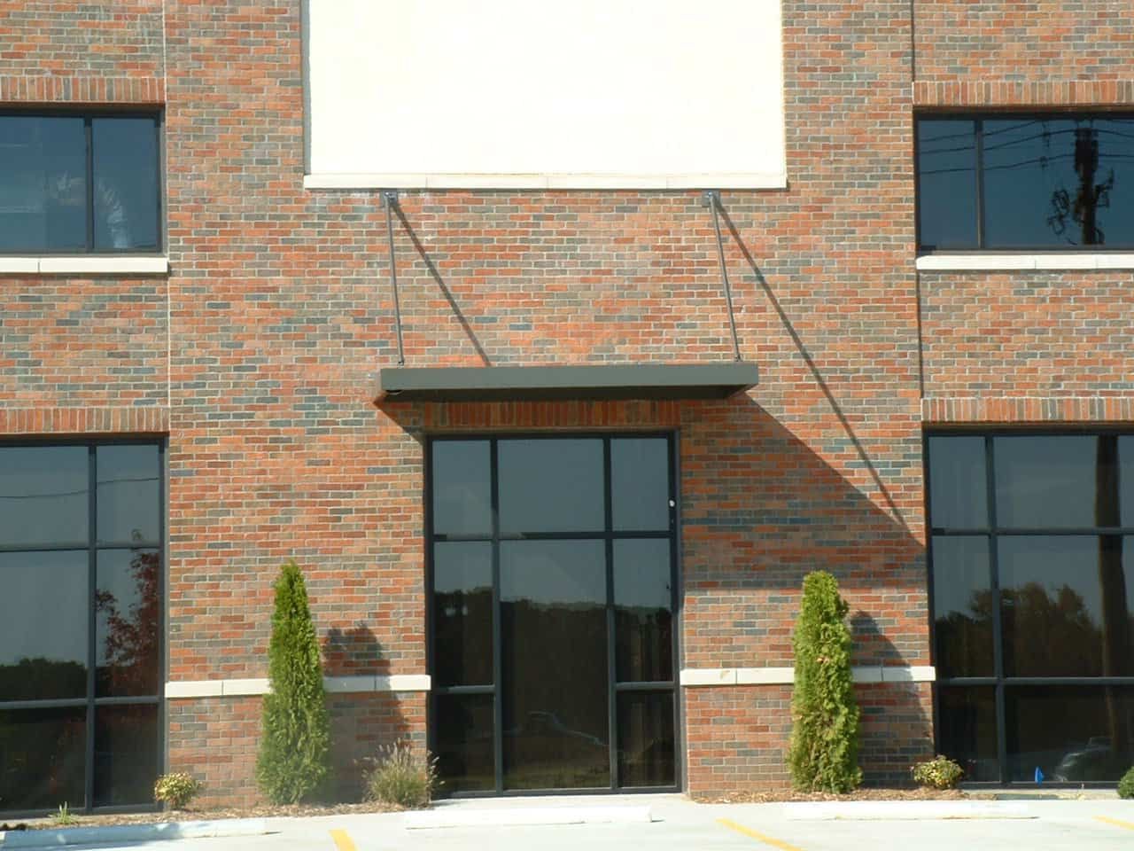 Aluminum rod canopy awning with extruded gutter