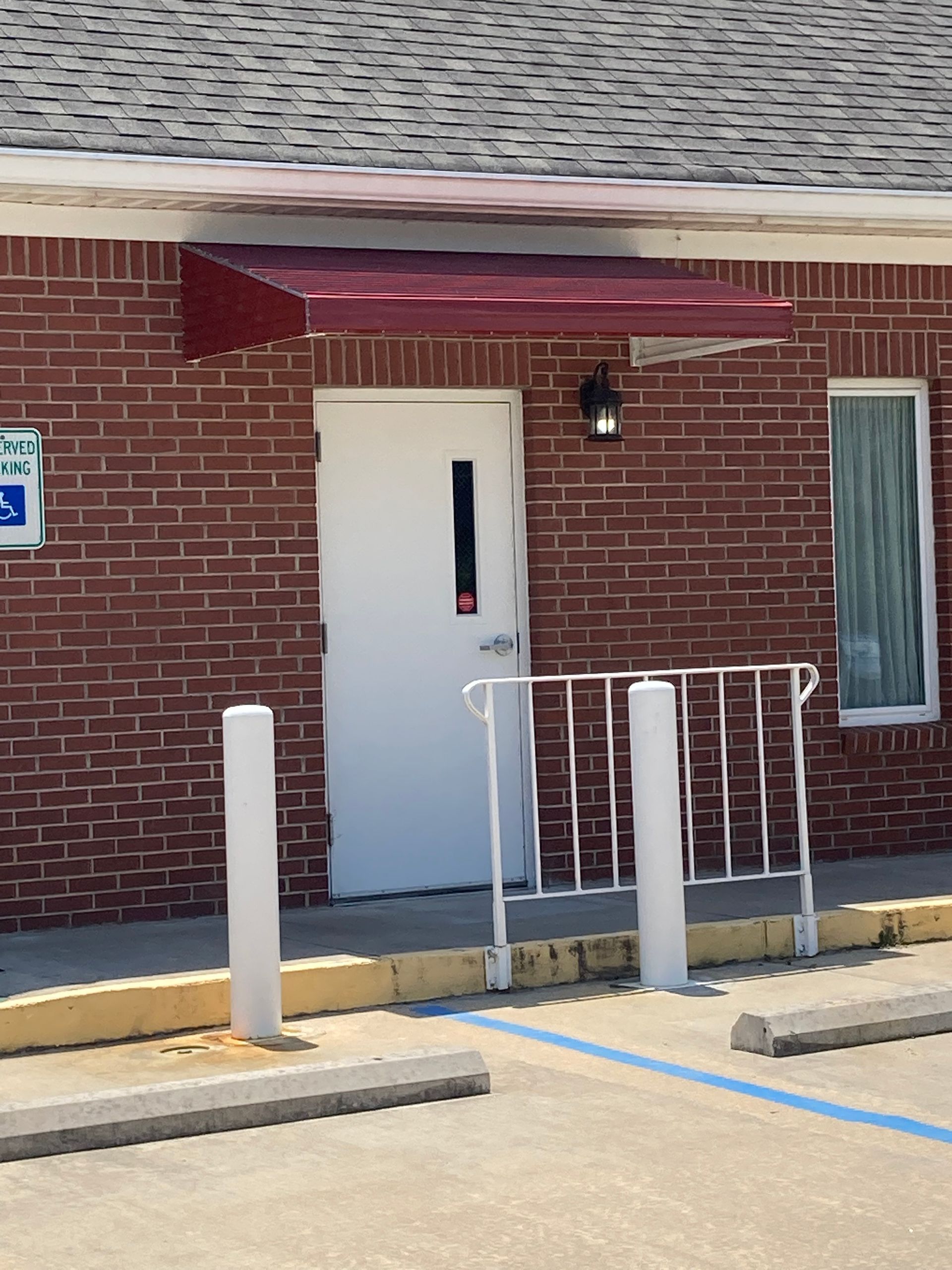 Step down aluminum awning with red and grey