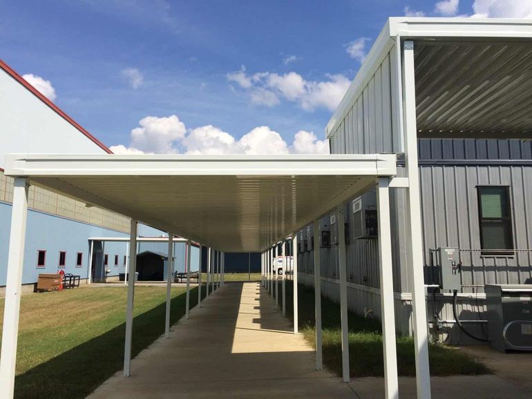 White aluminum walkway cover