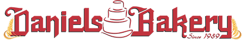a red and white logo for daniel 's bakery