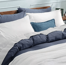 Washed bedsheets and pillows