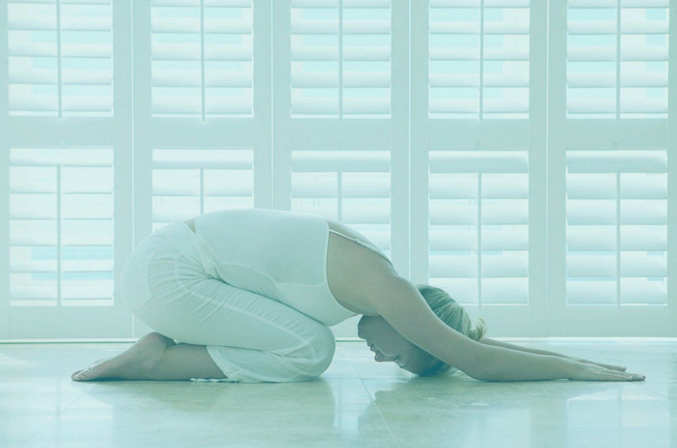 Women in Child's Pose - Yoga