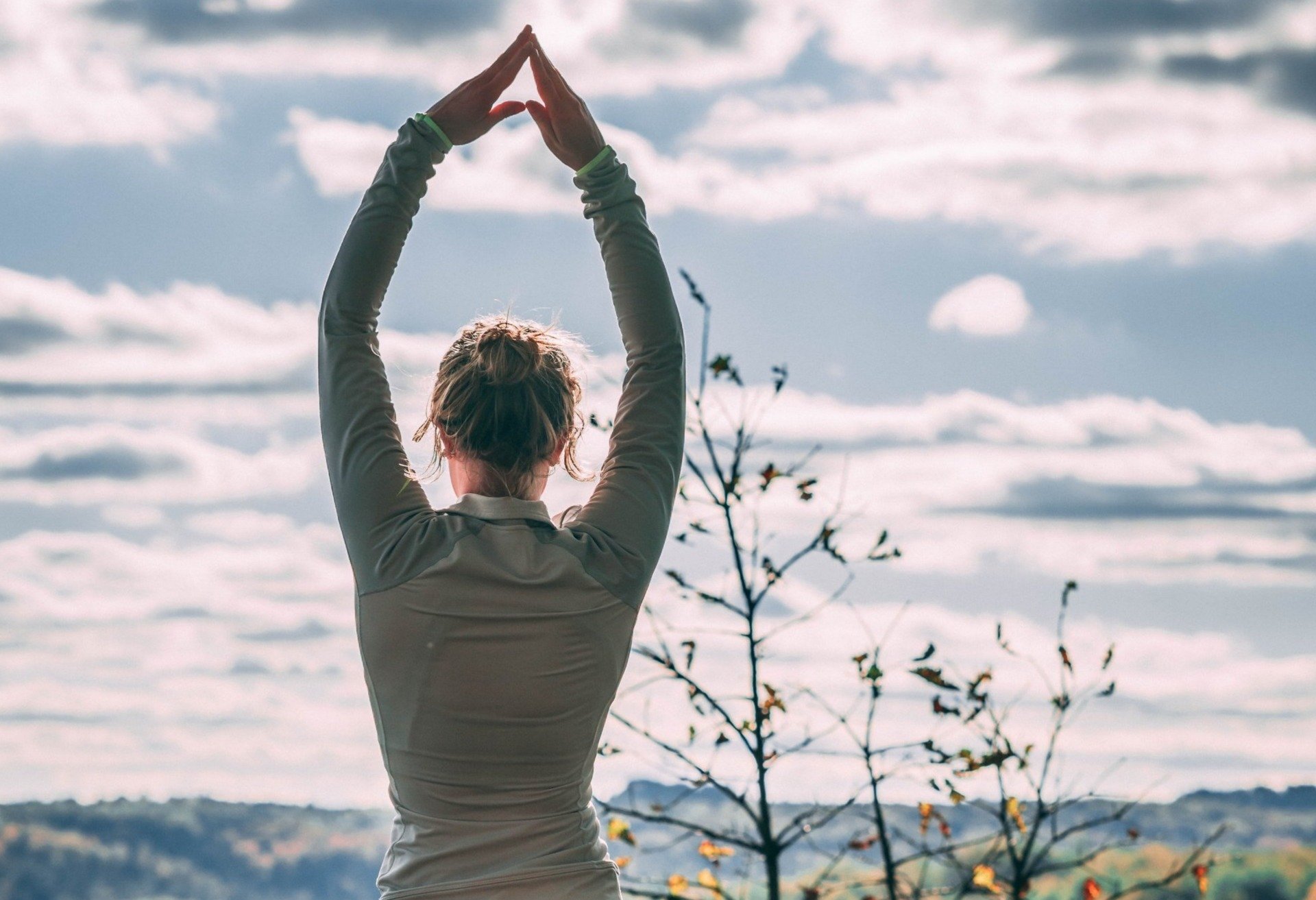 woman doing yoga in nature