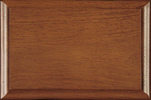 A close up of a piece of wood with a sample stain