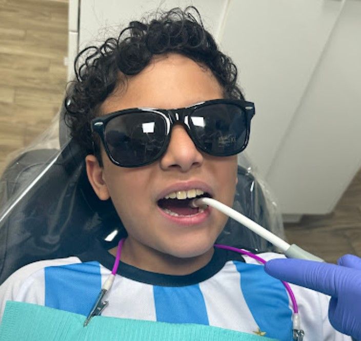 Kid getting dental check up