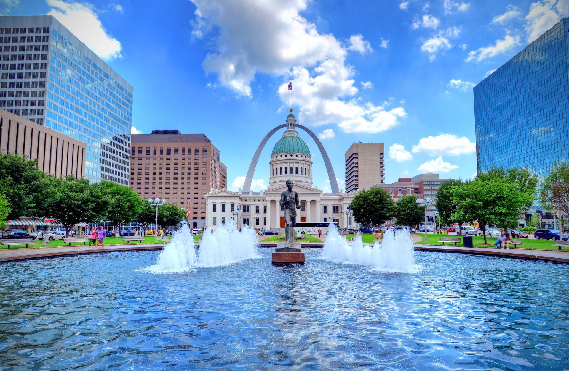 Downtown St. Louis with Gateway Arch and city fountain