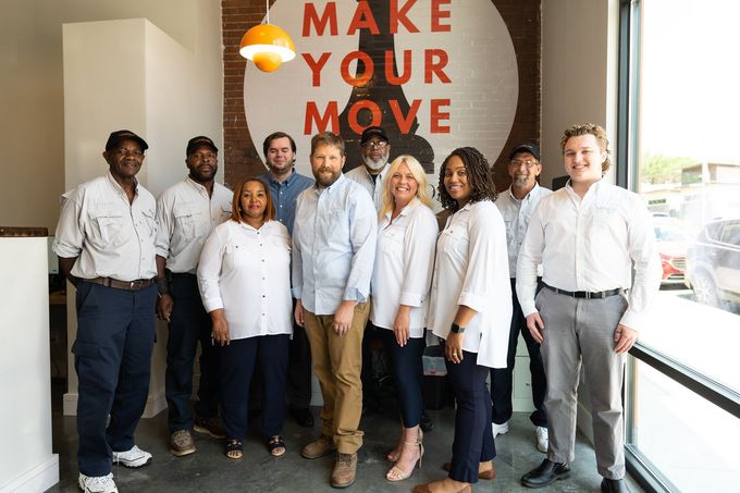 Group photo of Kingsland team members in business casual attire