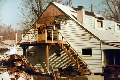 A house with stairs leading up to the second floor
