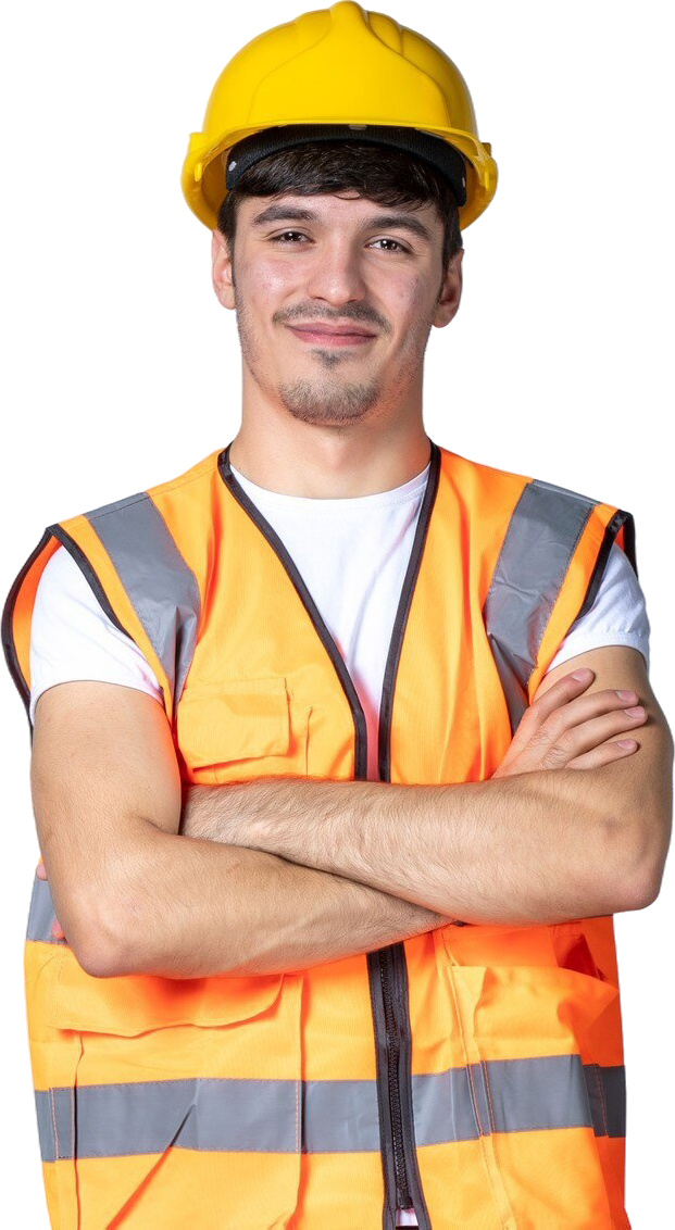 A man wearing a hard hat and an orange vest is standing with his arms crossed.