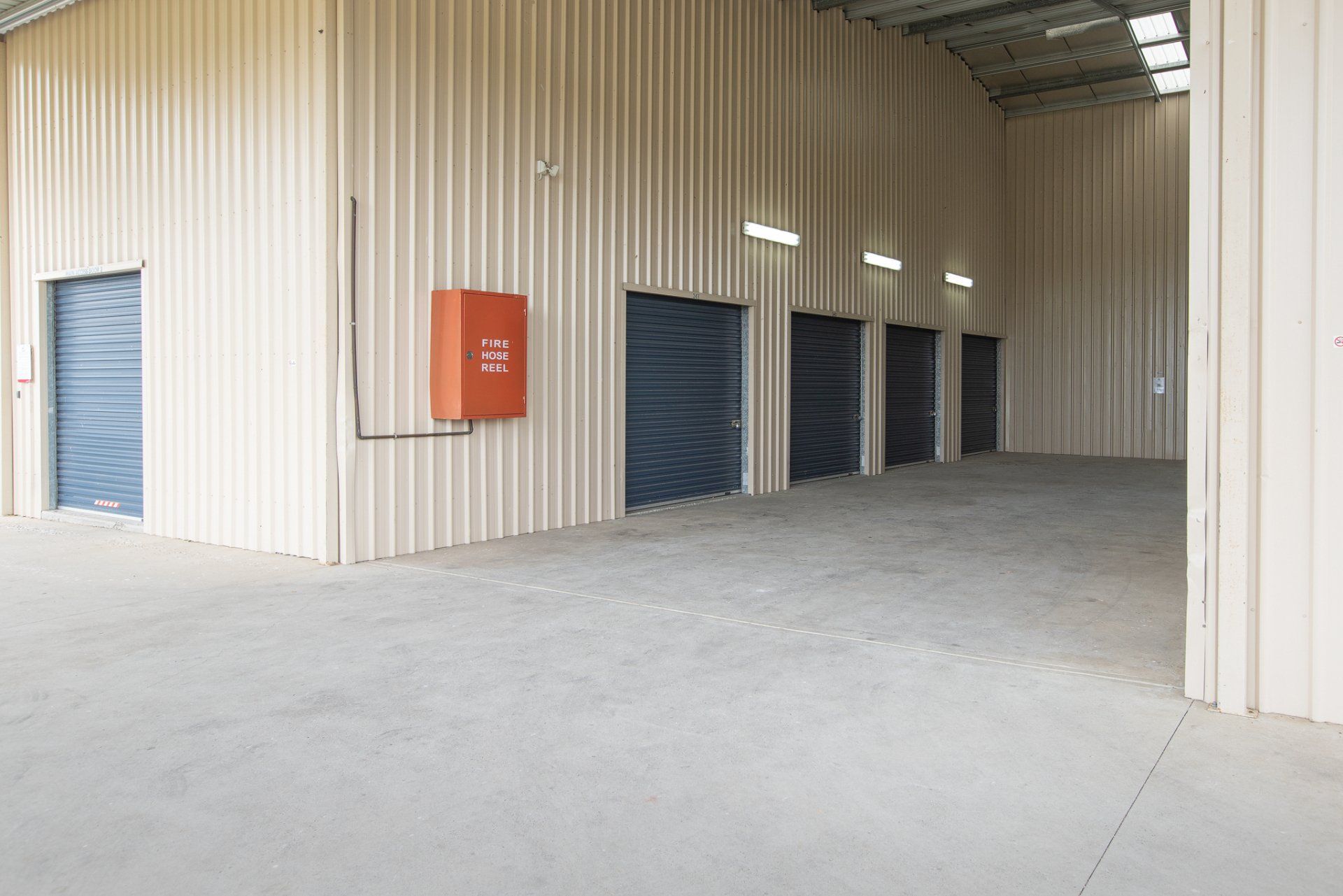 Empty Storage Unit With Opened Door — Storage Facility In Cessnock, NSW