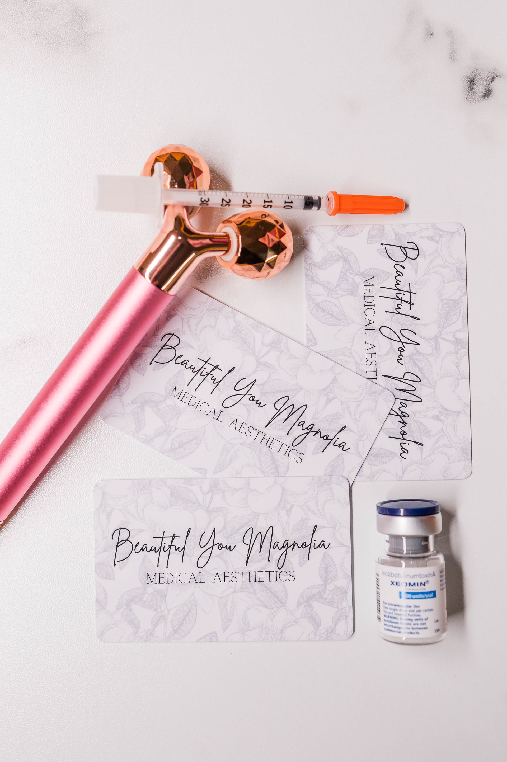 A sign that says be you only better is on a wooden shelf.