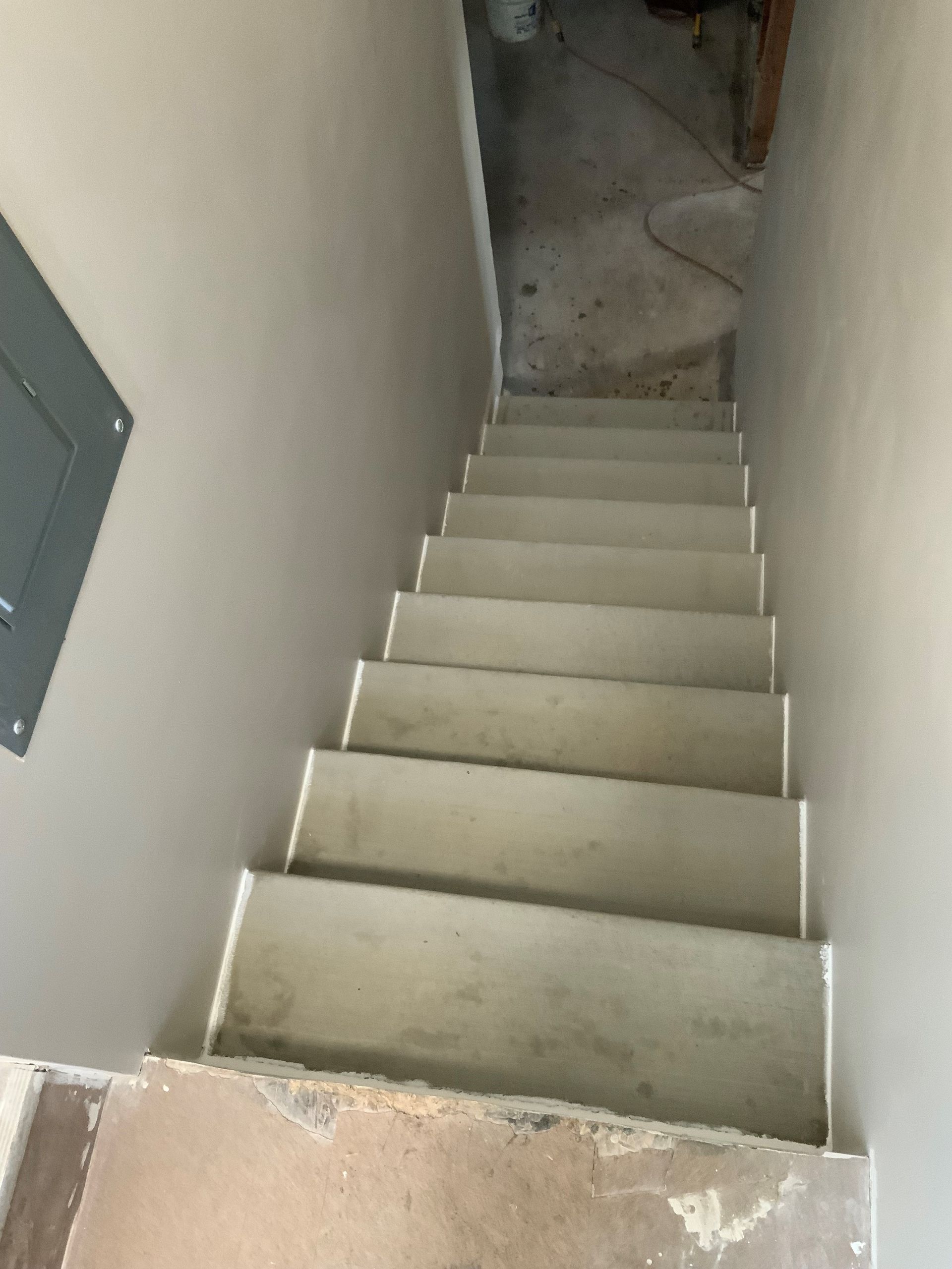 A set of stairs going up a wall in a building