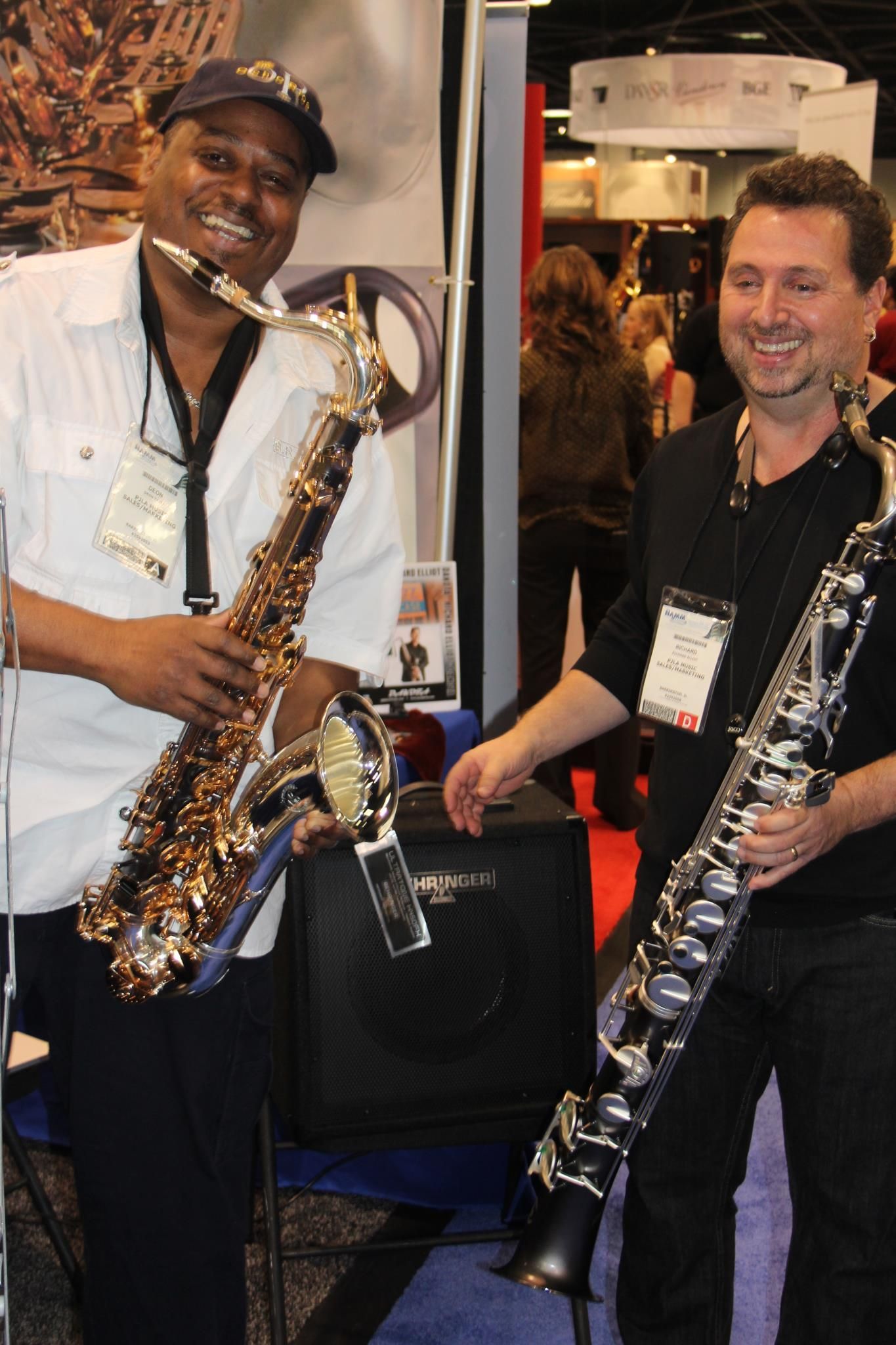 Deon Yates & Richard Elliot holding a saxophones