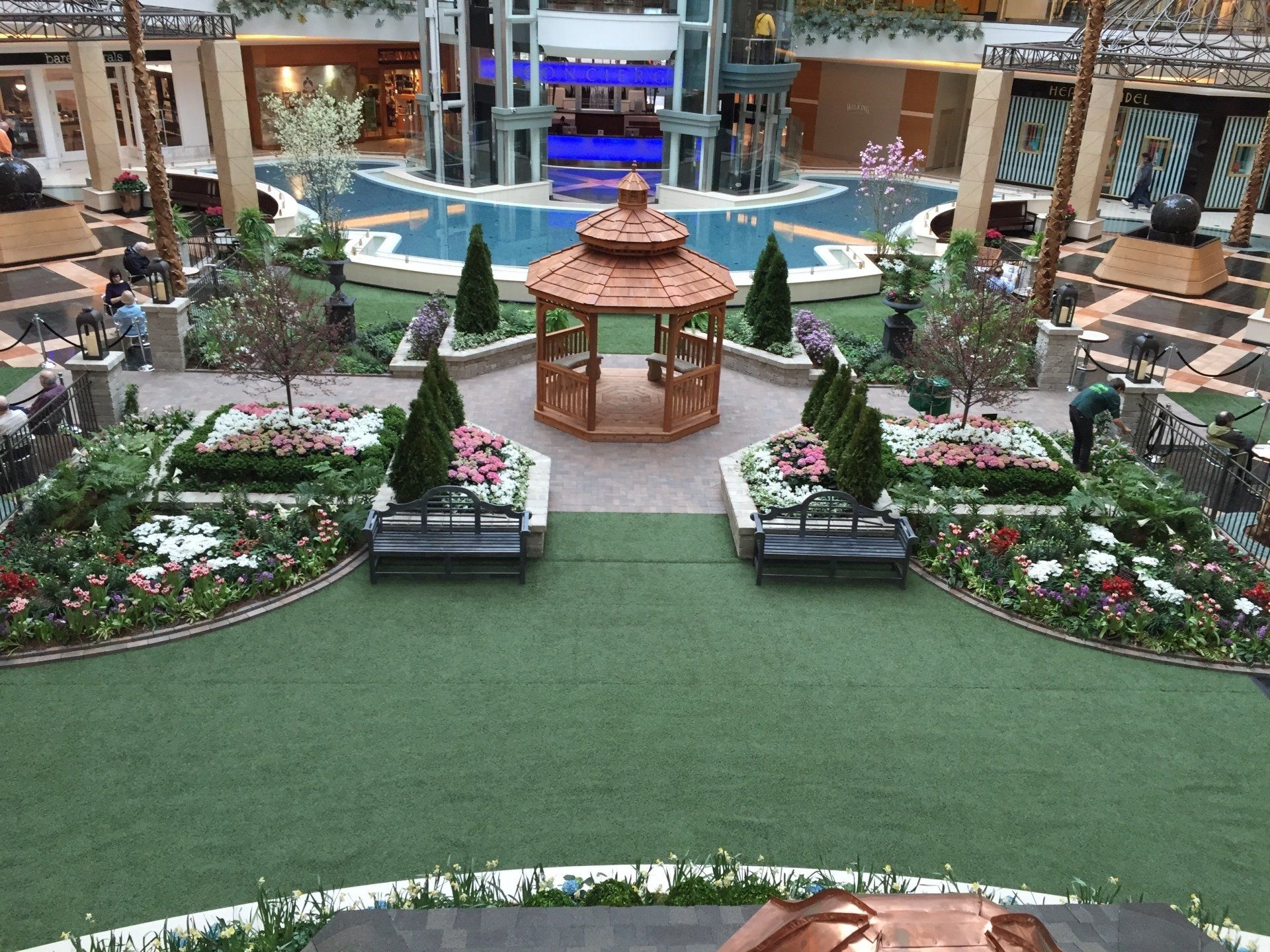 A large building with a gazebo in the middle of it
