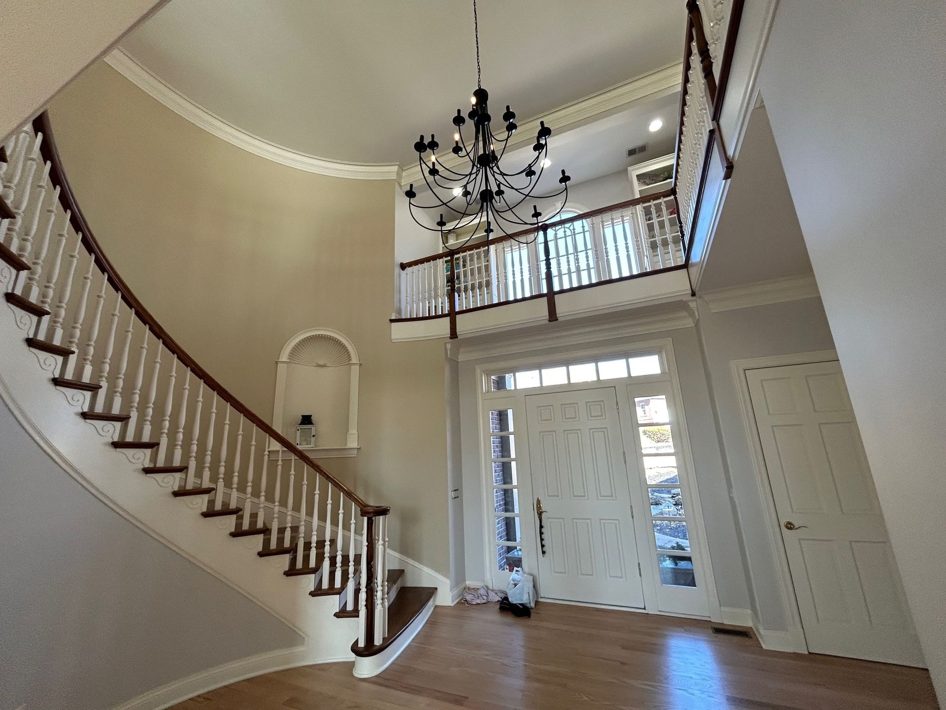 A wooden staircase leading up to the second floor of a house.