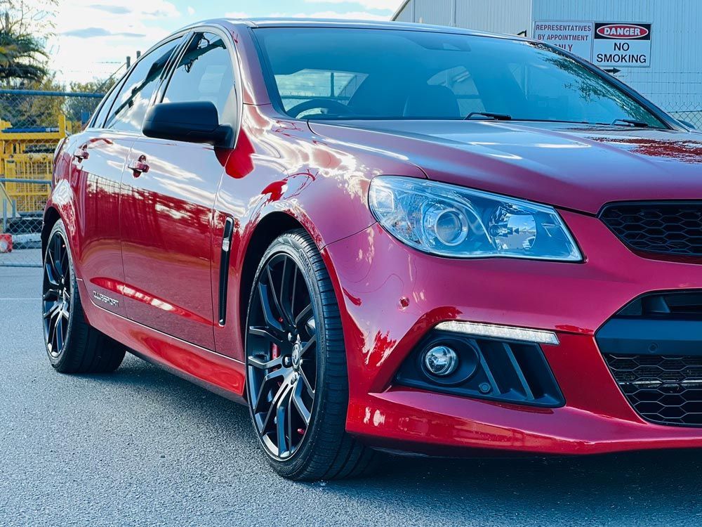 Side Left Red Car — Shane’s Car Detailing & Office Cleaning in Taminda, NSW