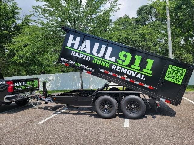 A black dump trailer for 