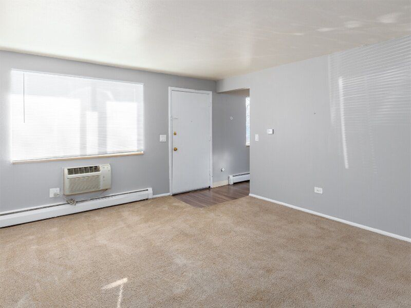 Carpeted Living Room | Powderhorn Apartments