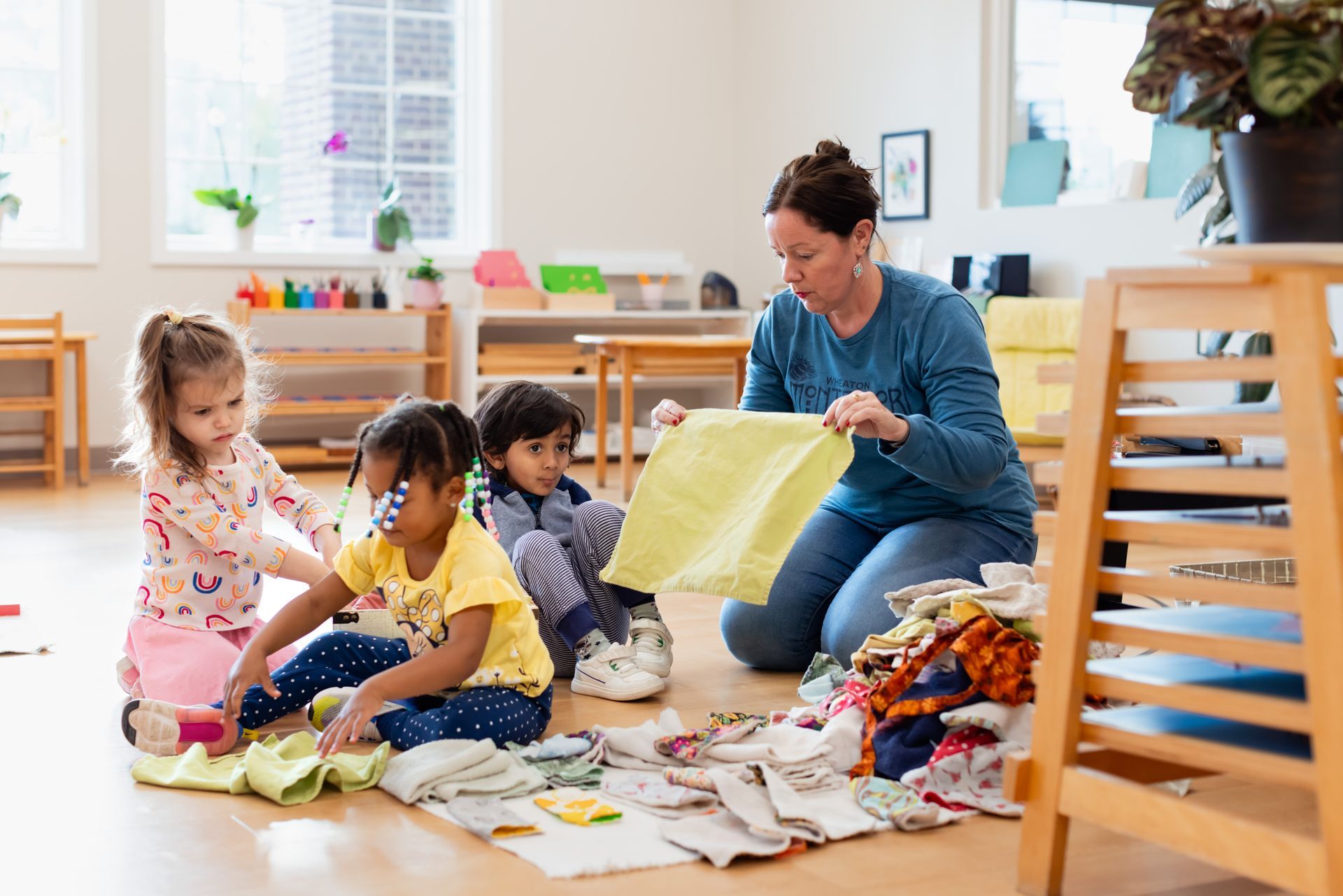 montessori child and guide in the classroom