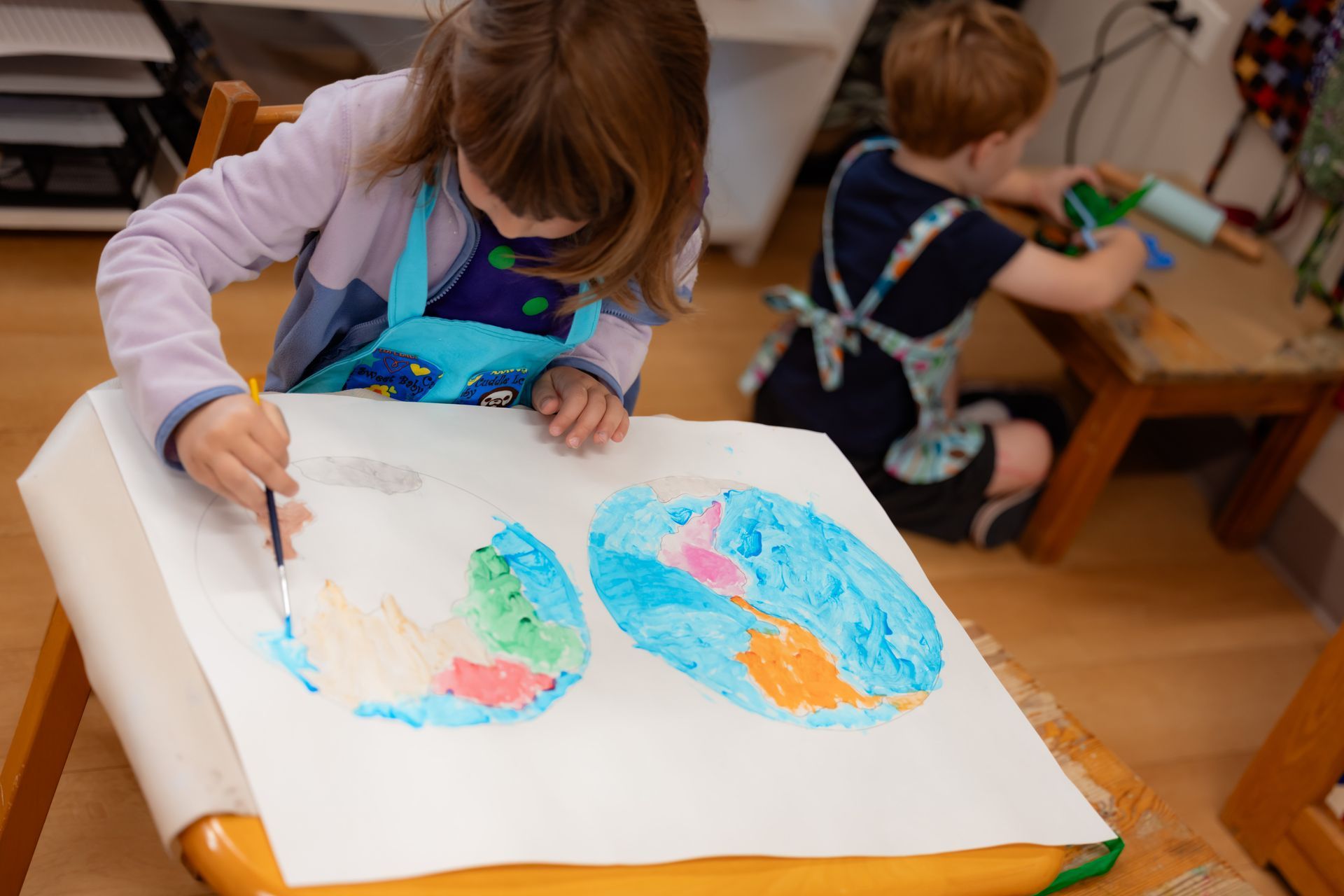 Montessori child working cultural project