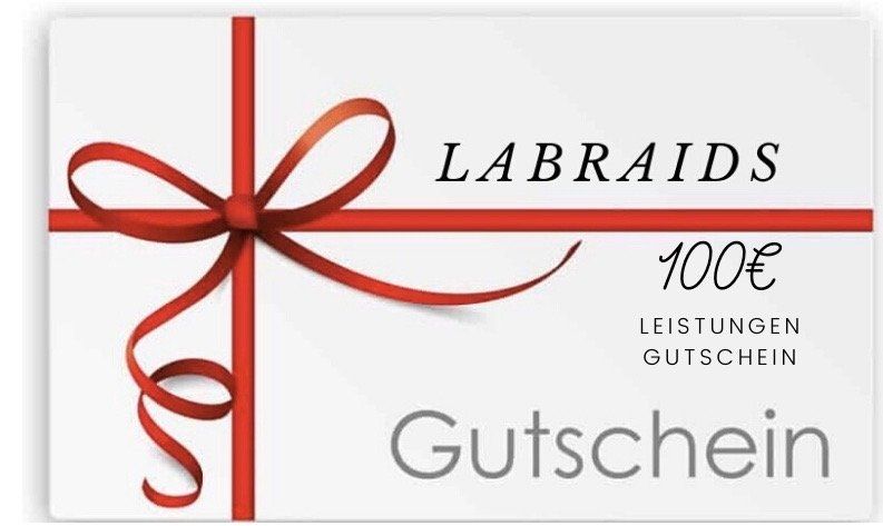 Eine weiße Geschenkkarte mit einem roten Band und einer Schleife.