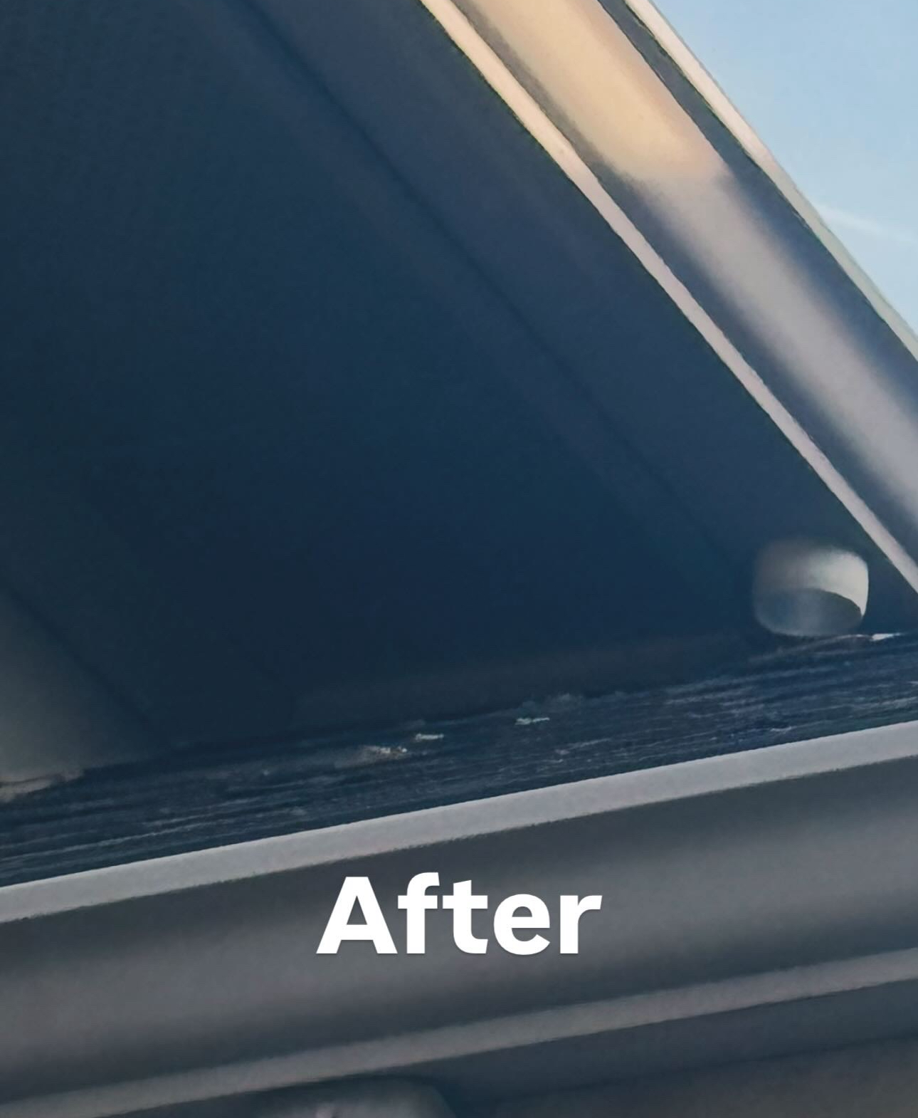 Gray roof and gutter, angled shot, with 