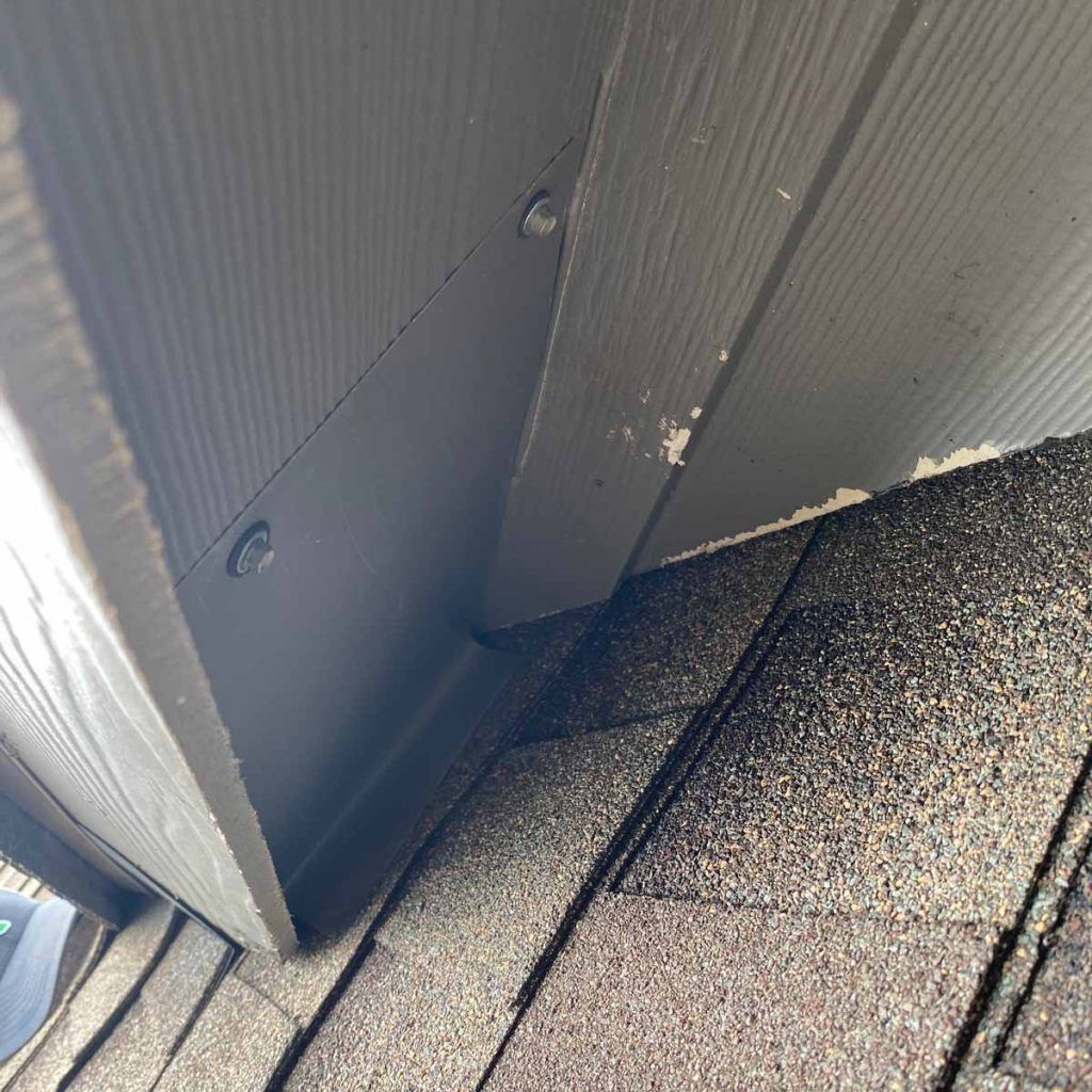 A close up of a roof with a hole in it.