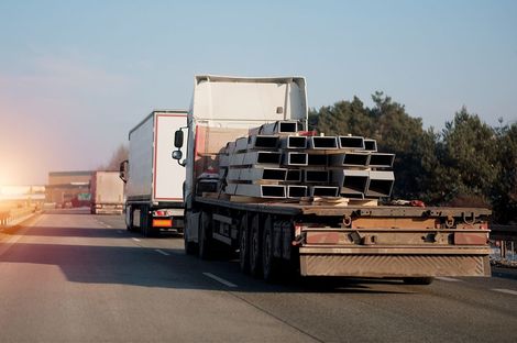 Two trucks on a highway