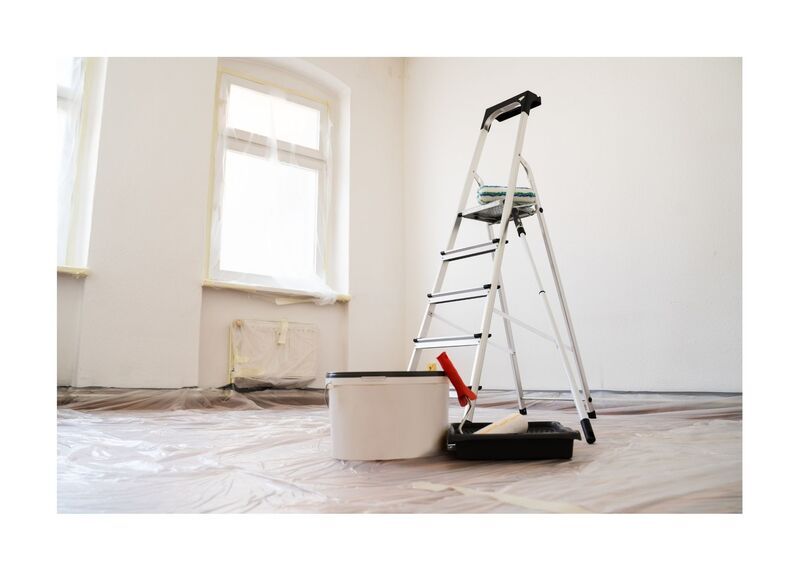 New Westminster Painting Ladder and paint equipment in empty room